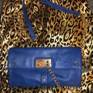 Royal blue purse with gold chain details
